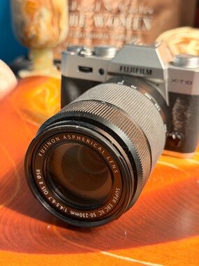 Fujifilm Silver and Black X-T10 with Black Fujinon 50-230mm Lens
